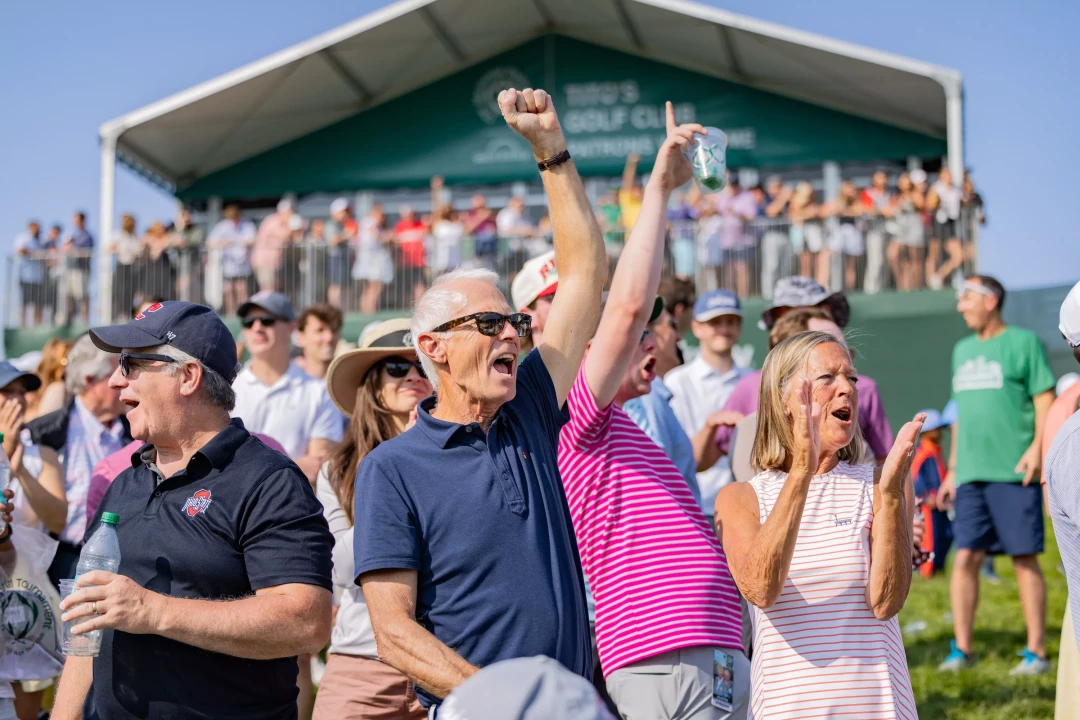 fans cheering and clapping